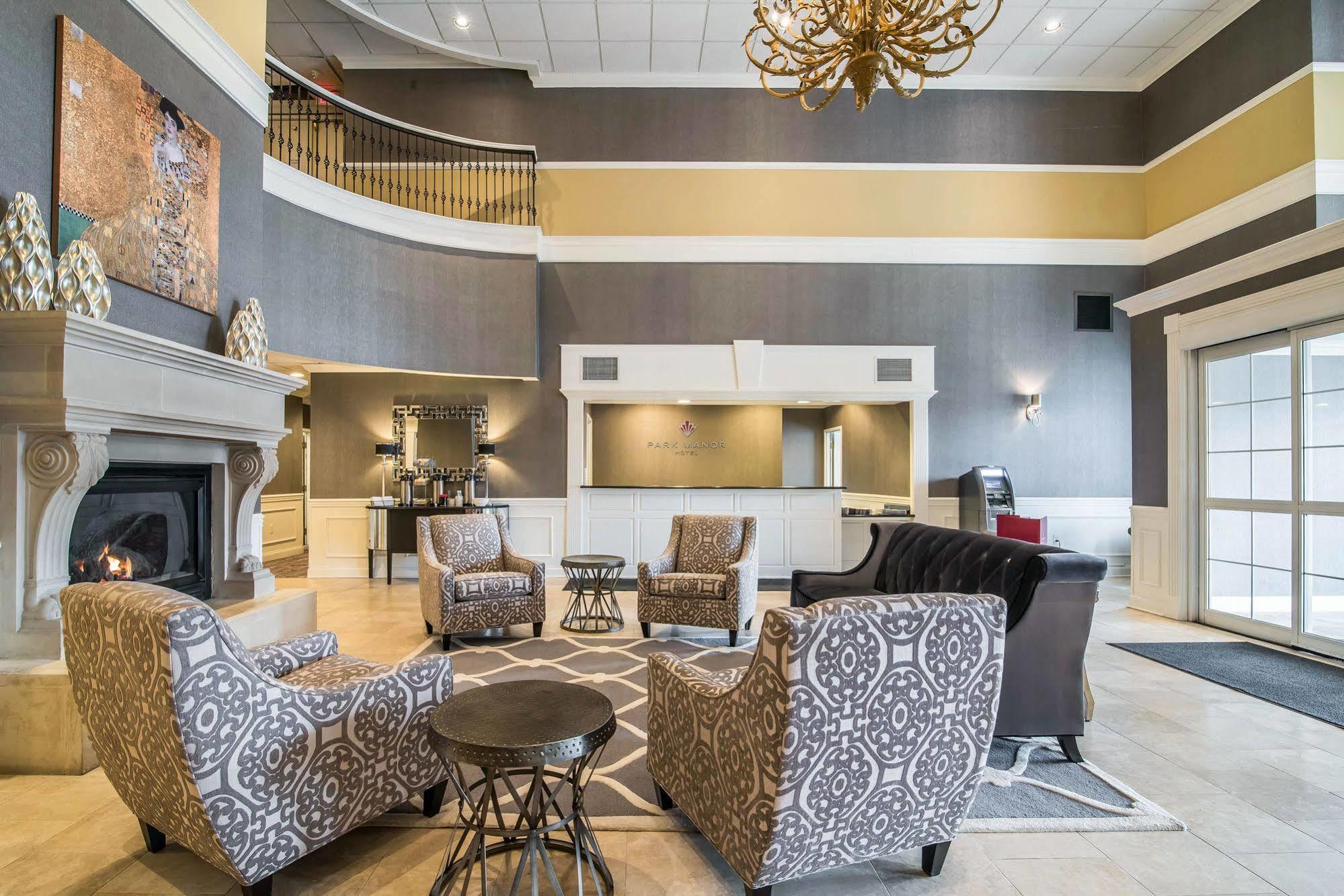 Park Manor Hotel Clifton Park Kültér fotó The lobby of the Best Western Premier Executive Residency Royal Palm Beach